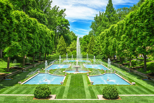 Kennett Square, Pennsylvania, USA - June 10, 2016:  Longwood Gardens botantical gardens at the Peirce-du Pont House. 10, 2016:  Longwood Gardens botantical gardens at the Italian water garden.