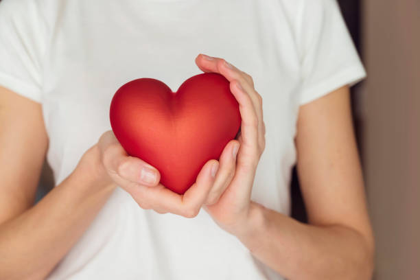 istock Woman holding red heart 2063265806