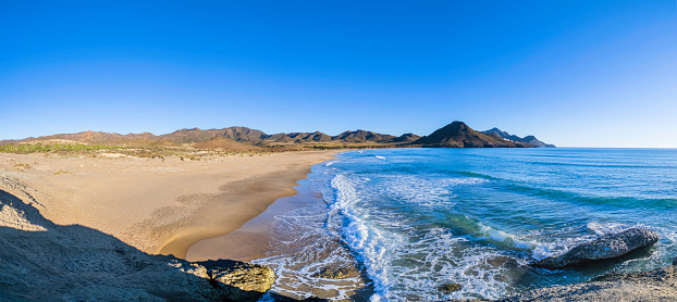 Playa de Los Genoveses, a remote wide beach within walking distance through wild plants and low dunes of sand (5 shots stitched)