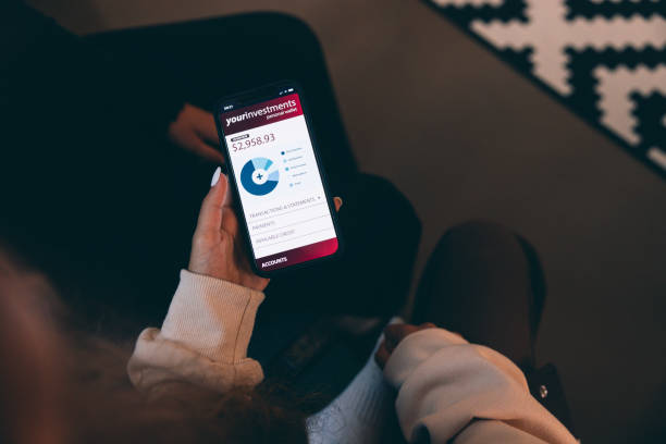 istock Teenager checking savings account on mobile app 2063289561