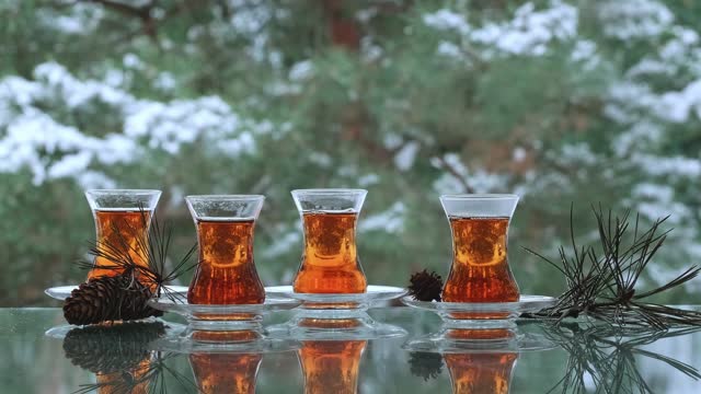 Turkish tea in cup in wintertime outdoors
