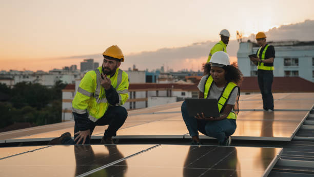 istock Service engineer checking solar cell on the roof for maintenance if there is a damaged part. Engineer worker install solar panel. Clean energy concept. 2063305729