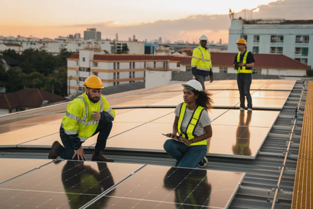 istock Service engineer checking solar cell on the roof for maintenance if there is a damaged part. Engineer worker install solar panel. Clean energy concept. 2063307315