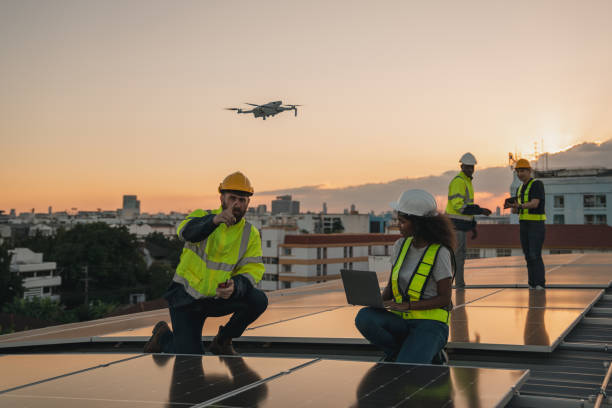 istock Service engineer checking solar cell on the roof for maintenance with drone technology. Engineer worker install solar panel. Clean energy concept. 2063307840