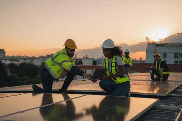 istock Service engineer checking solar cell on the roof for maintenance if there is a damaged part. Engineer worker install solar panel. Clean energy concept. 2063307881