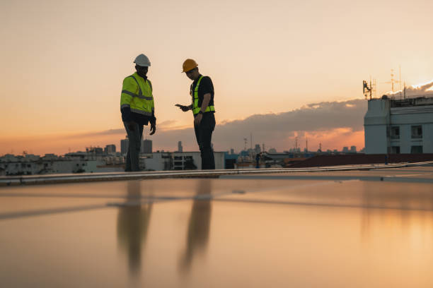 istock Service engineer checking solar cell on the roof for maintenance if there is a damaged part. Engineer worker install solar panel. Clean energy concept. 2063308413