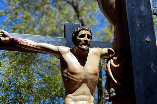 Crucified Jesus Christ over  gloomy skies.More religious images: