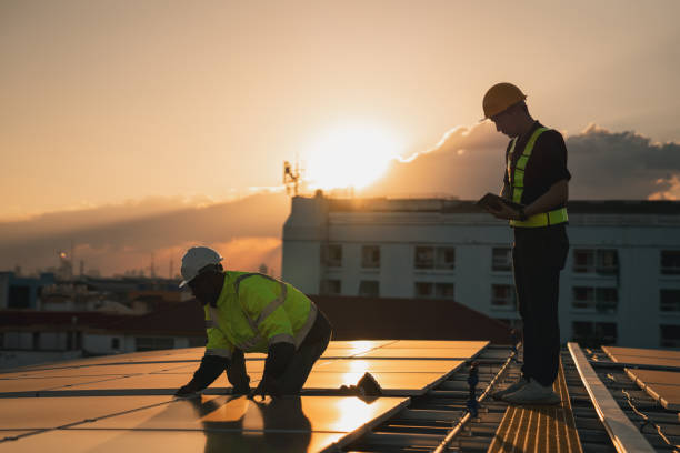 istock Service engineer checking solar cell on the roof for maintenance if there is a damaged part. Engineer worker install solar panel. Clean energy concept. 2063311683