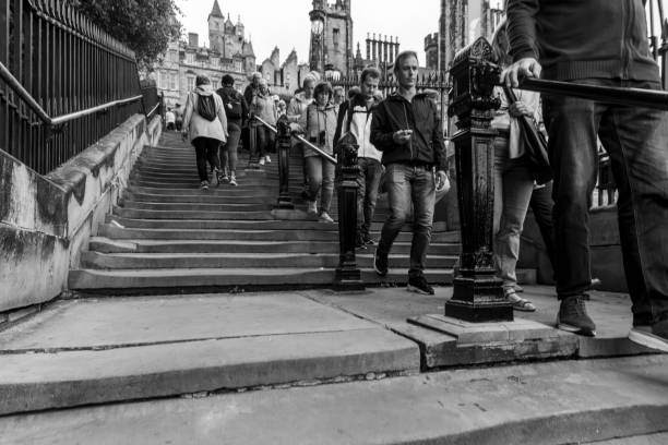 Paris, France - Nov 09 2011: A crowd of people gathers on the steps leading up to the Sacré-Cur Basilica on Montmartre
