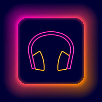 Glowing neon line Noise canceling headphones icon isolated on black background. Headphones for ear protection from noise. Colorful outline concept. Vector.