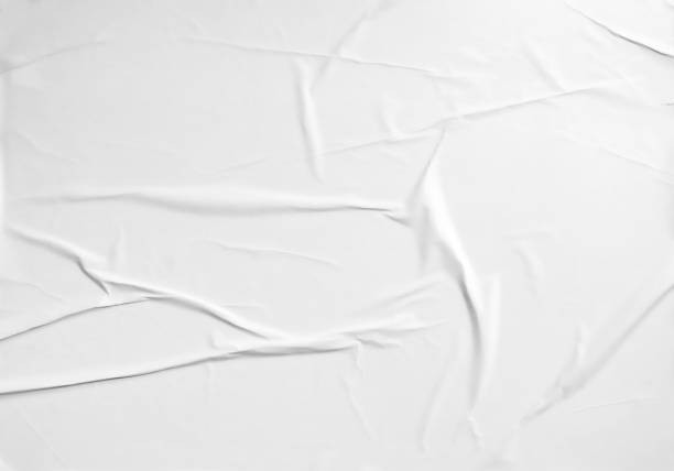 istock Paper wrinkled and crumped texture, glued poster template. 2063341083