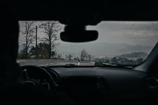 istock Driving car in storm and bad visibility. 2063349448