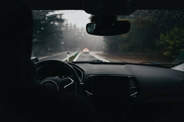 istock driving on highway road in bad weather conditions. 2063350142