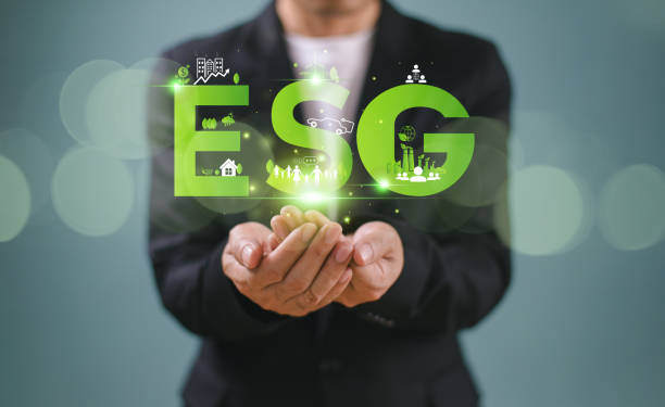 istock ESG environment social governance concept. Man use computer analyze ESG icon. Green environmental business finance strategy concept. ECO corporate company report, sustainable business investment 2063352267