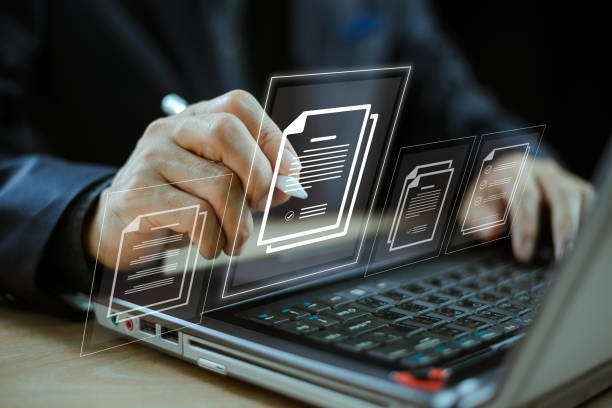 istock Electronic signature concept. Business people sign electronic digital documents, paperless office, future business contract online. Man use computer agreement technology, e-document management 2063352271