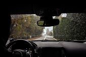Driver view on autumn country road.