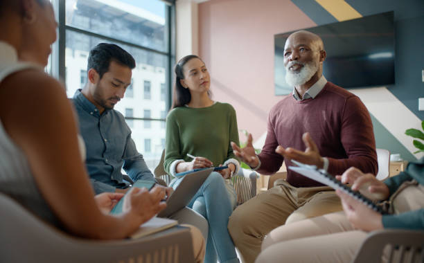 istock Workshop, circle and business people in office with leadership, corporate training and startup seminar. Brainstorming, ideas and professional team building meeting for planning, growth or opportunity 2063360161
