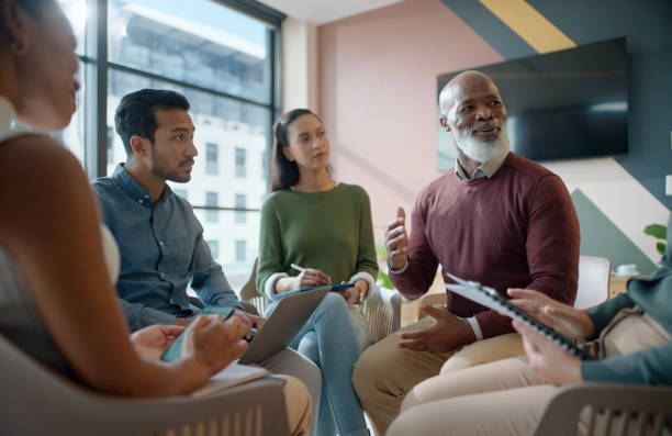 istock Workshop, circle and business people in office with training, seminar and ceo in conference room. Meeting, ideas and professional team building with planning for growth, development and opportunity 2063361775