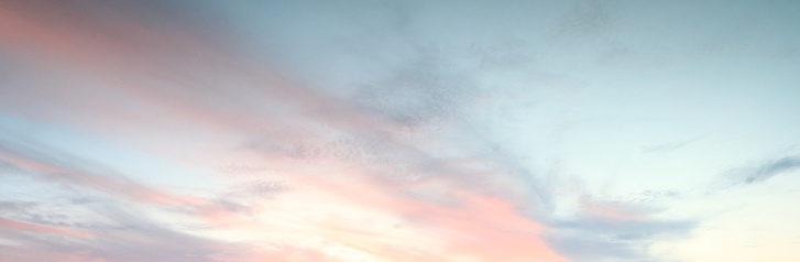 sky background with fluffy clouds and sunset and sunrise light