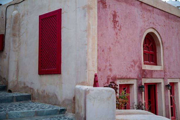 Traditional Santorini architecture with red accents