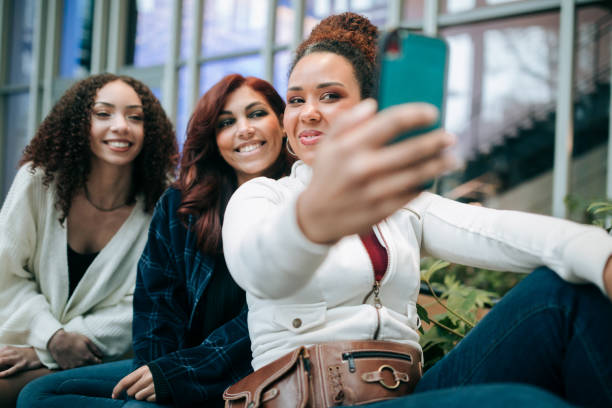 istock Friend Group of Women Talking on College Campus 2063376247