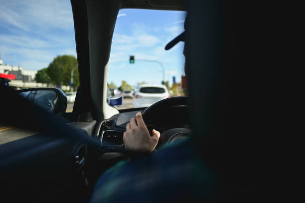 istock Driving car on city street. 2063395784