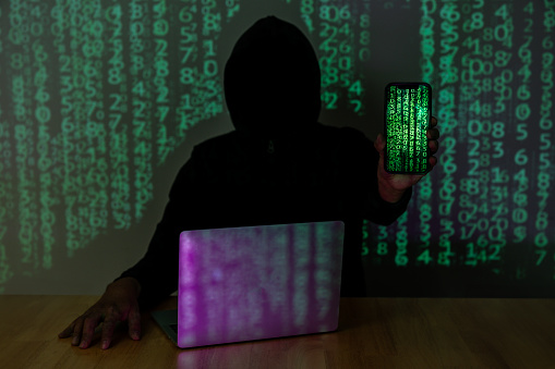 A hacker is currently stealing information from a computer, Cyber Security Concept.