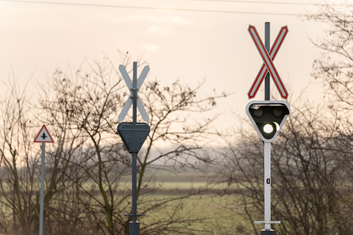 Level crossing signal in Hungary at sunrise