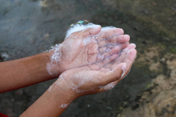 istock hands with soap foam.  washing hands.  anti-bacterial.  hygiene concept 2063429147