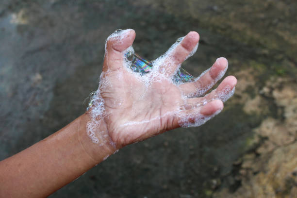 istock hands with soap foam.  washing hands.  anti-bacterial.  hygiene concept 2063429158
