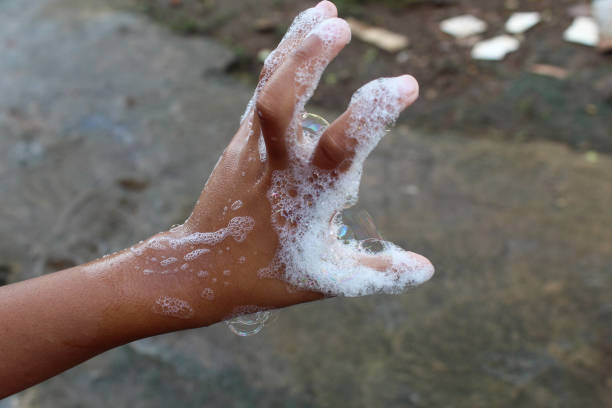 istock hands with soap foam.  washing hands.  anti-bacterial.  hygiene concept 2063429678