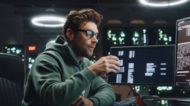 istock Software engineer looking monitors in advanced monitoring office close up. 2063456320