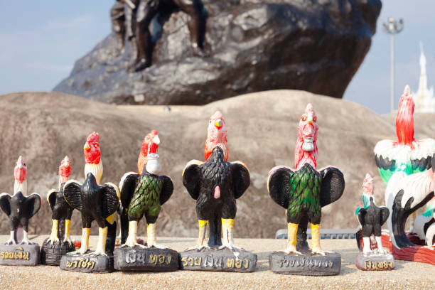 Placed different seized  thai cockerel  figurines below King Naresuan monument in Lampang for  history  of marching King Naresuan the Great Through Lampang. Monument was made in 1992 To honor Her Majesty His Majesty the Queen's fifth anniversary in 1992 for independence of the nation and place of worship for the general public and source of historical study