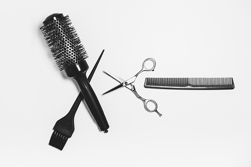 Hairdresser accessories on the white background. Hairdresser tools. Black and white.