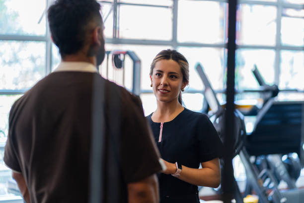 istock two sports doctors are inside the gym he works for. 2063470061