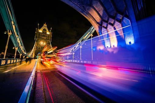 Traffic Crossing Tower Bridge, London, UK