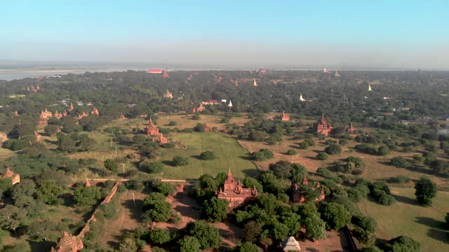 Bagan Myanmar, drone aerial view sunrise with temples and old pagodas at the historical UNESCO site