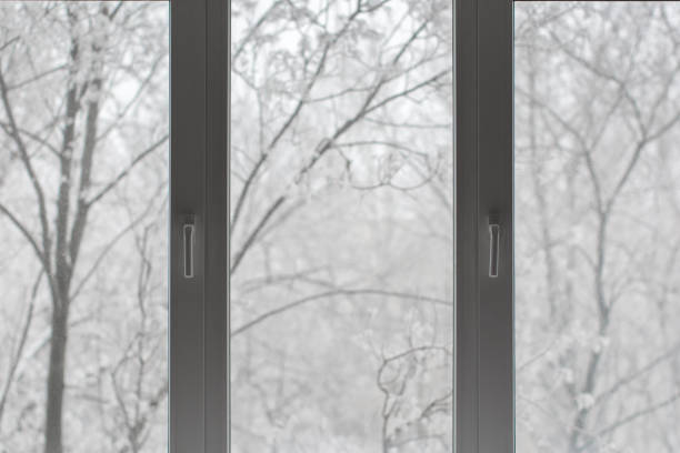 istock Window with winter view of snowy background. 2063551270