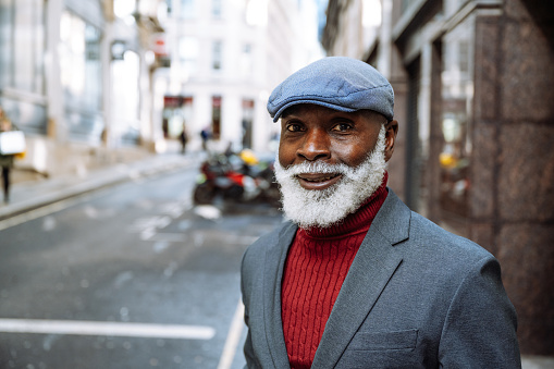 Senior African - Afro-Caribbean smart dressed man in the city
