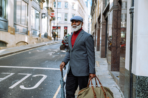 Senior African - Afro-Caribbean smart dressed man in the city