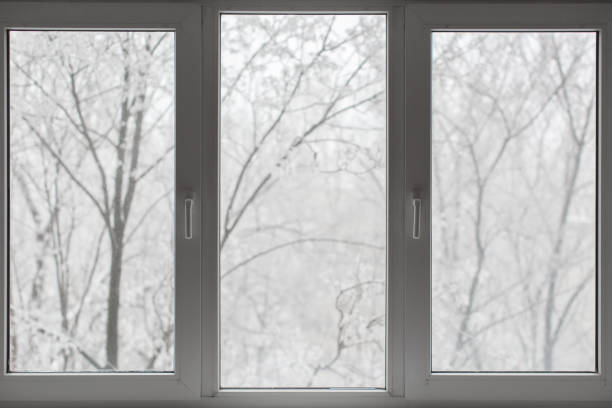 istock Window with winter view of snowy background. 2063561971