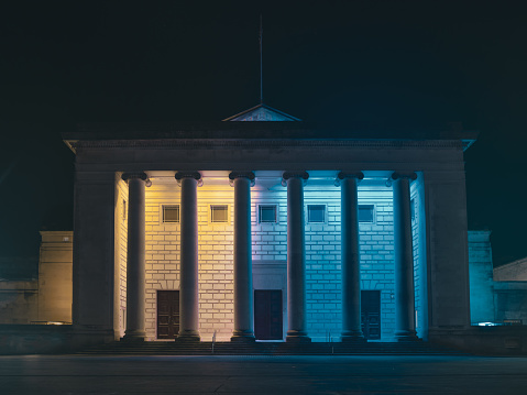 front view of guild hall southampton with ukraine flag colors at night