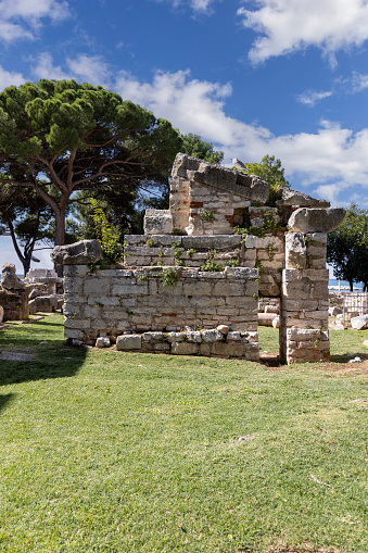 Porec, Croatia, Istria - September 25, 2023: Remains of Neptune Temple dedicated to god of the sea. It is 1st century roman temple
