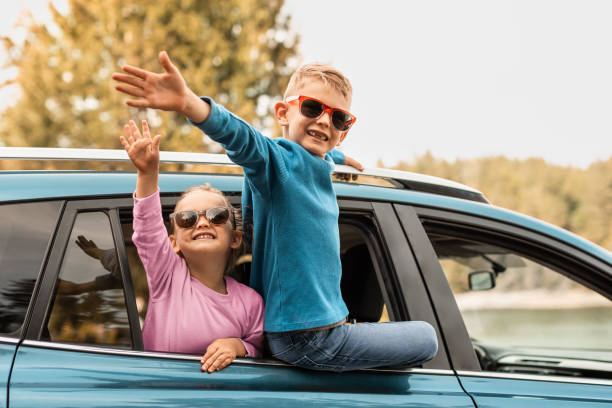 istock Happy kids on the road trip. 2063584404