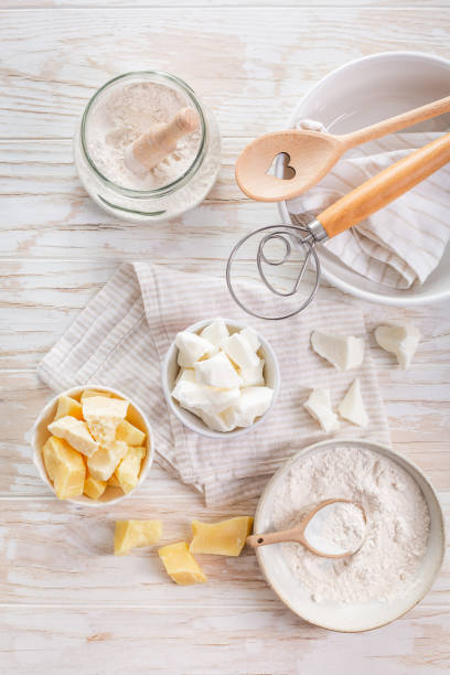 istock Organic cacao butter and baking ingredients with kitchen utensils 2063586727