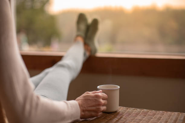 istock Cup of tea and beautiful view. 2063599757