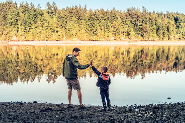 Father and son bonding outdoors.