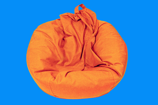 Bean bag chair that has lost its form. Home improvement and comfort regaining concept.