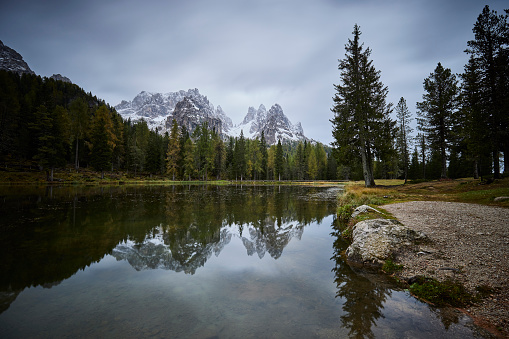 Lake Antorno (Lago d'Antorno), autumn landscapes in Dolomites, Italy on a grey day.