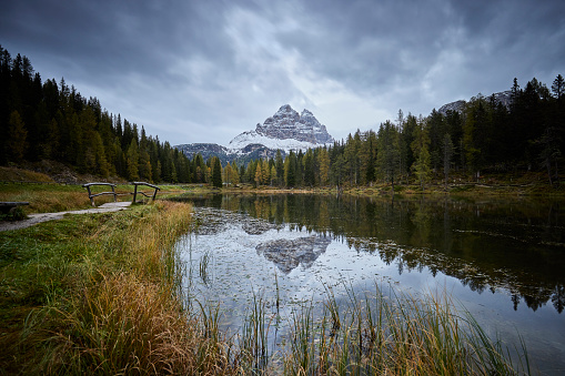 Lake Antorno (Lago d'Antorno), autumn landscapes in Dolomites, Italy on a grey day.